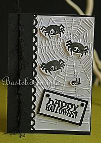 Halloweenkarte mit Spinnen